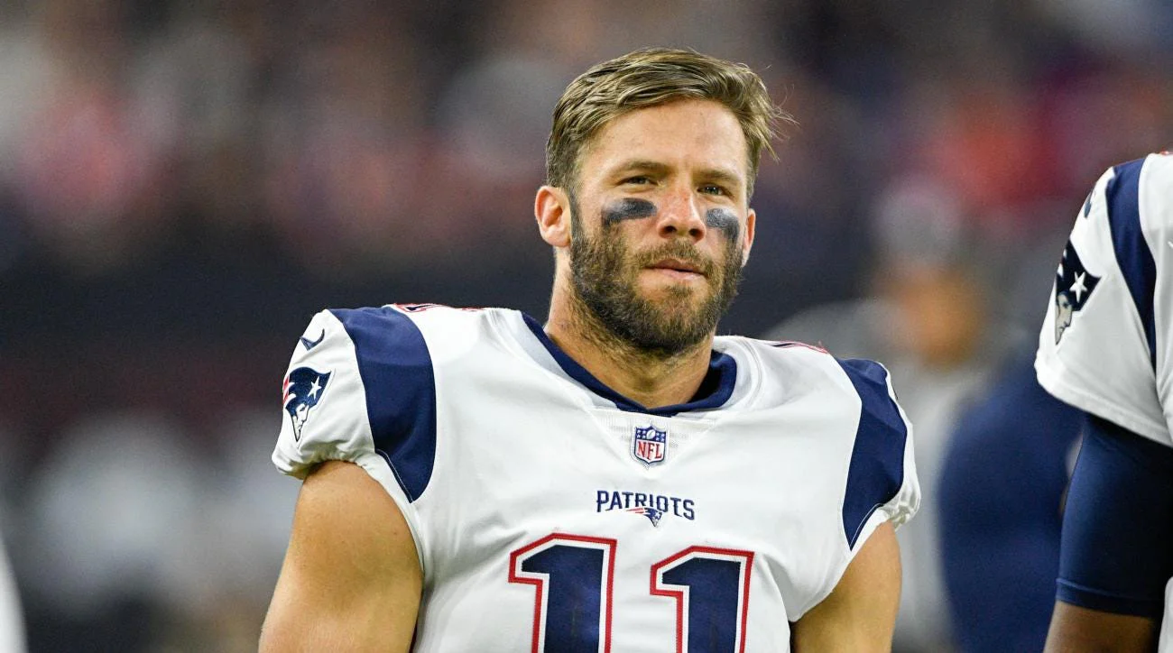 Julian Edelman celebrating Super Bowl win in Patriots uniform.
